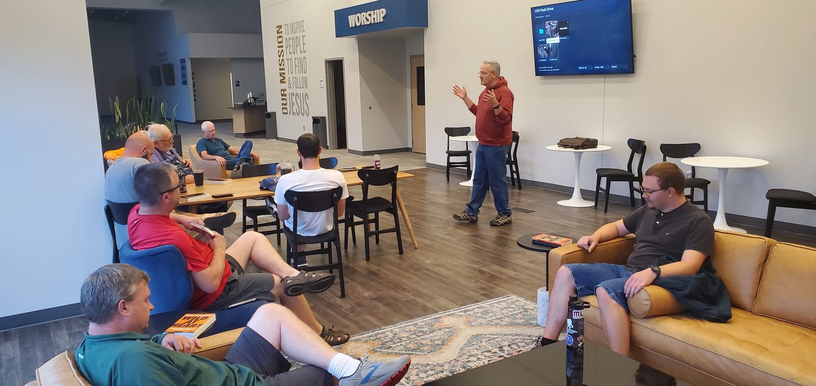 A Band of Brothers leader teaching while men listen and discuss