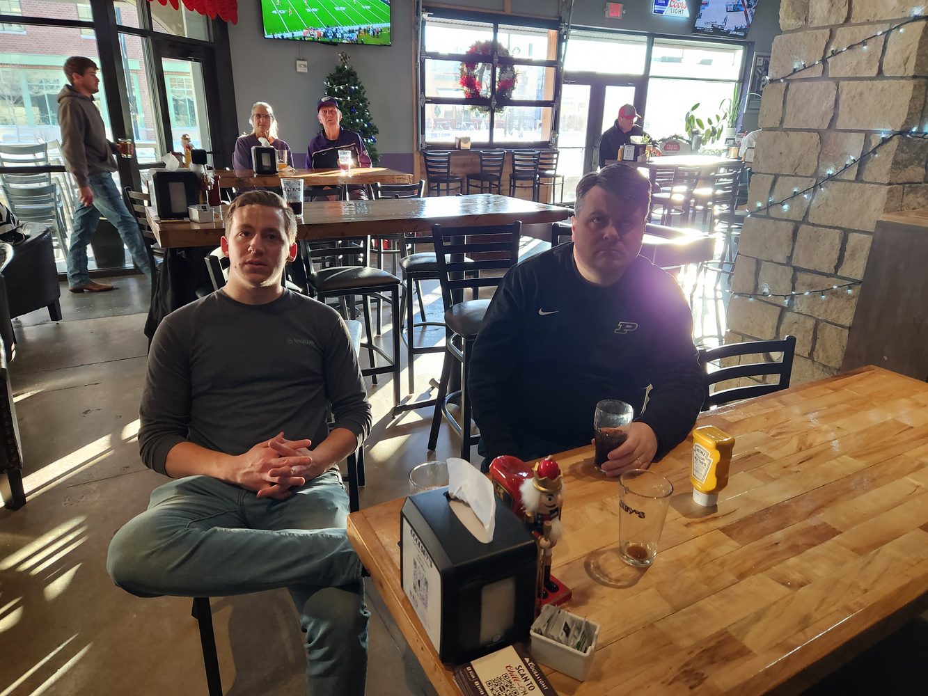 CV Men visiting together at Goolsby's